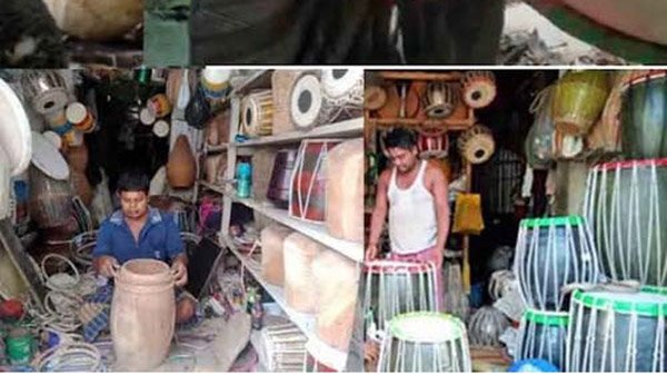 ব্যস্ত সময় পার করছেন বরিশালে ঢাক-ঢোলসহ বাদ্যযন্ত্র তৈরির কারিগররা